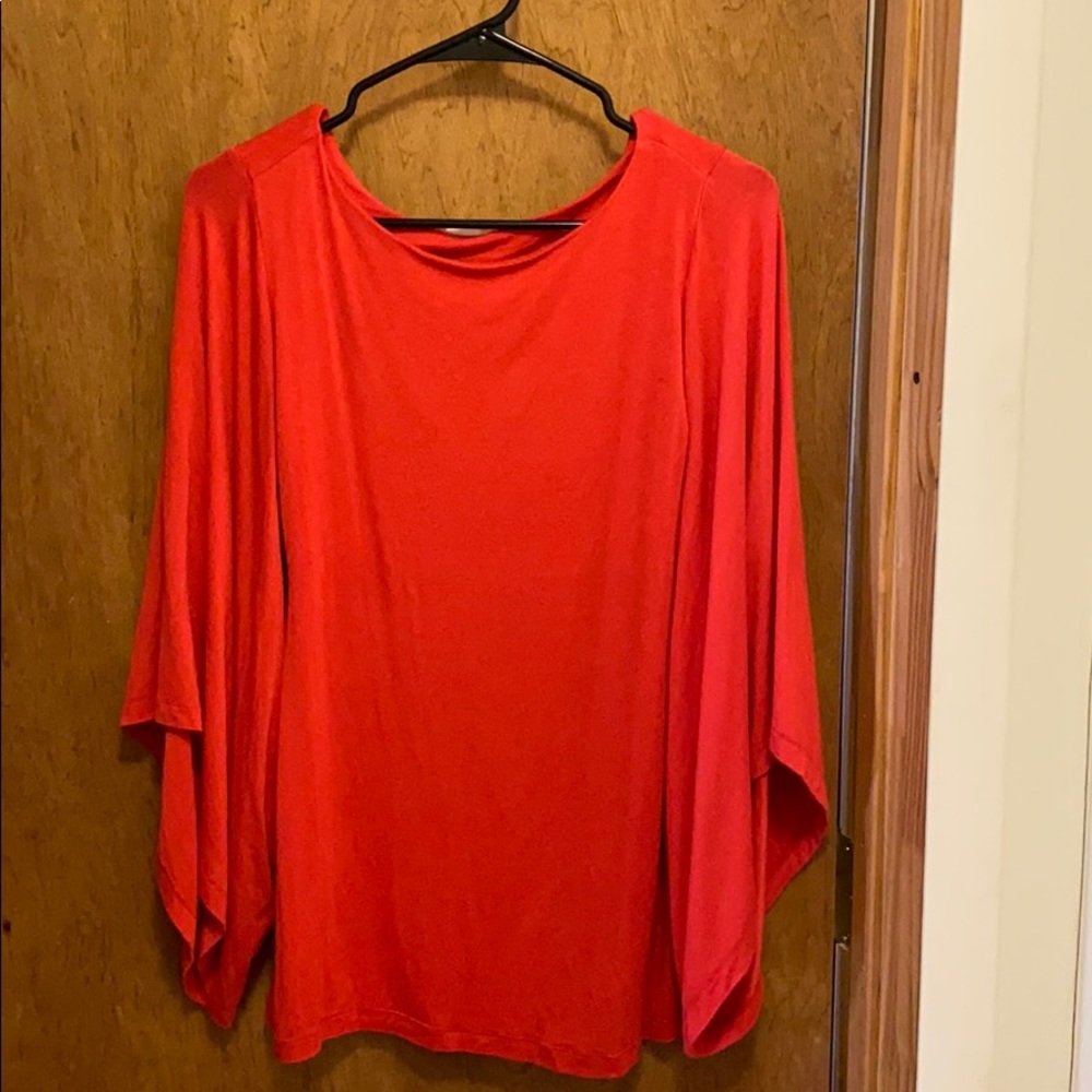 Wide arm, pink stretchy top